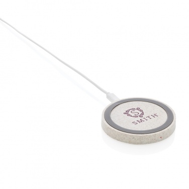 Logotrade Werbeartikel das Foto: Rundes 5W Charging Pad aus Weizenstroh