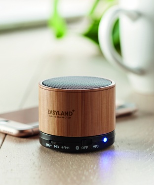 Logotrade advertising products photo of: Round Bamboo wireless speaker