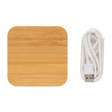 Лого трейд pекламные подарки фото: Беспроводное зарядное устройство Bamboo 5 Вт с USB-портом