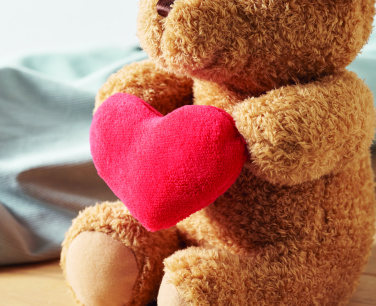 Логотрейд pекламные продукты картинка: Teddy bear with heart 23cm